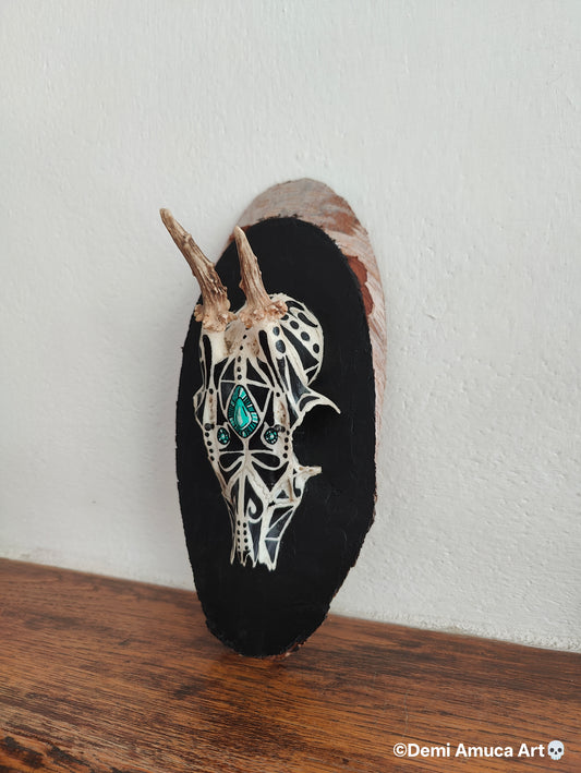 Small painted deer skull