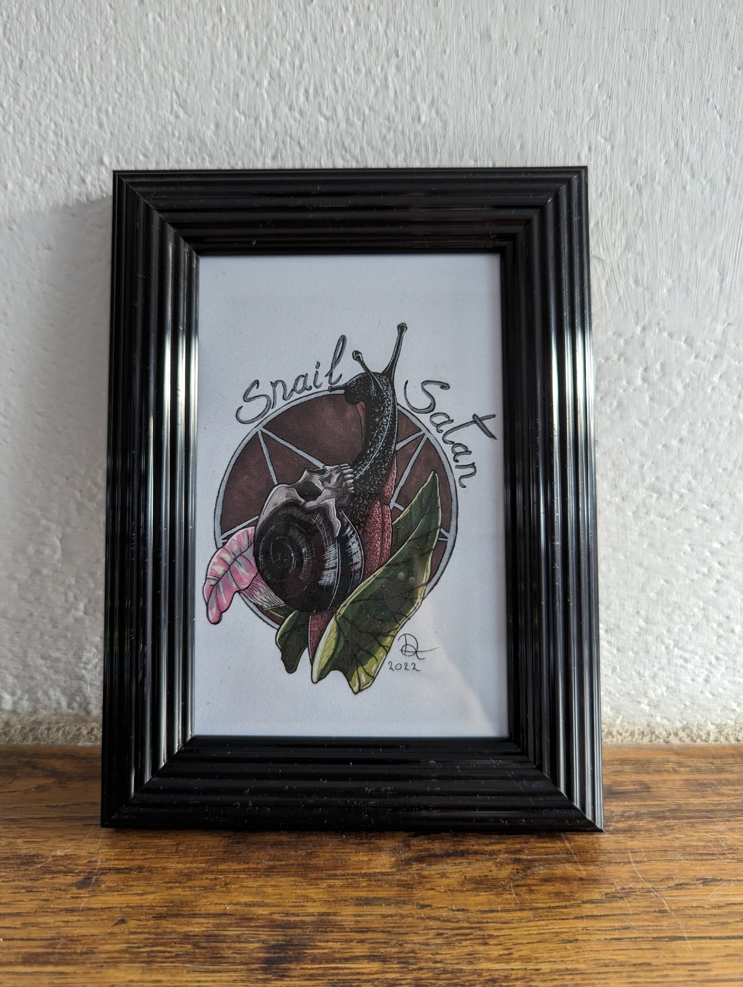 Framed Art Print Snail Satan